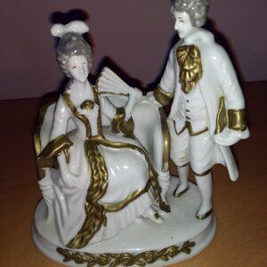 Vintage Porcelain Figurine .